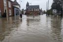 The flooding in Albert Place, Framlingham during Storm Babet