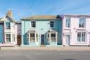 This pastel blue holiday cottage is located on Aldeburgh's high street