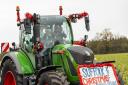 Organisers Louise Davy and Katherine Cross lead off the Christmas Tractor Run