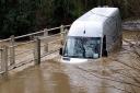 The van was pictured stuck in floods near Stowmarket