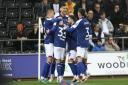 Ipswich Town kept within touching distance of the top two after beating Swansea City 2-1