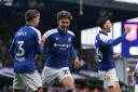 Jeremy Sarmiento (centre) is congratulated by Leif Davis after restoring Ipswich Town's lead against Birmingham City.