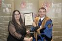 Ana Marques receiving her award from Chris Wood, Master of The Worshipful Company of Butchers