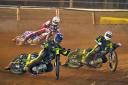 Adam Ellis (blue helmet) and Emil Sayfutdinov (red) leading  Dan Bewley in heat six, although the Belle Vue rider came through to win.