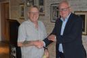 Danny Davey - overall winner get his prize from former EADT editor Terry Hunt