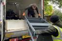 Mid Suffolk District Council teams help collect water-damaged furniture in Debenham on Tuesday morning  Picture: Mid Suffolk District Council