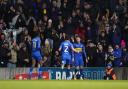 AFC Wimbledon thrashed Ramsgate FC to set up an FA Cup third-round tie against Ipswich Town
