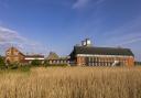 Snape Maltings Concert Hall, on the bank of the River Alde in Suffolk, has been granted listed status.