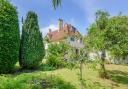 The property enjoys lovely gardens which are well-stocked with fruiting trees