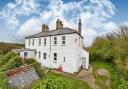 This four-bedroom coastguards cottage with a sea view is for sale for £295k