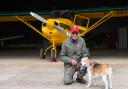 Pilot Robin Smith flies his aircraft alongside his beloved Beagle Steffi.