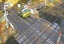 CCTV records a lorry being struck by a level crossing barrier in Essex