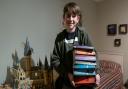 Eli Chmelik, 11, who has set the Guinness World Record for identifying the most Harry Potter characters from quotes from the Harry Potter films in one minute, at his home in Manningtree, Essex.