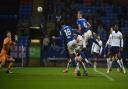 Luke Woolfenden attacks a corner at Bolton