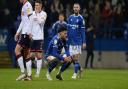 Macauley Bonne is disappointed on the final whistle at Bolton Wanderers.