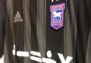 Ipswich Town will wear their all-black clash kit at Wigan Athletic tomorrow