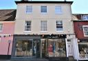 The three-bedroom apartment is situated over a shop in Woodbridge