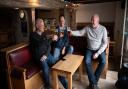 Steve Johnson, Leighton Hammett and Darrin Tompkins enjoying a drink together inside Isaacs for the first time in a year.