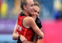 England's Hannah Martin (left) and Anna Toman celebrate victory against India. Picture: PA SPORT