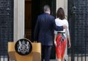 Prime Minister David Cameron walks into 10 Downing Street, London, with wife Samantha. Photo: Daniel Leal-Olivas/PA Wire