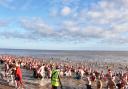 Hundreds of people wore Christmas hats as they braved the North Sea