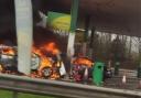 Two people are in hospital after a petrol station fire