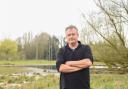 Sheep farmer Chris Reeks and the still-flooded pastureland on the Euston Estate