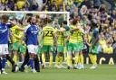 Norwich City players celebrate following their 1-0 win against Ipswich Town at Carrow Road.