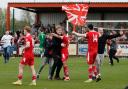 Needham Market players and fans celebrate promotion to the National League North