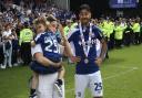 Massimo Luongo, pictured celebrating promotion to the Premier League with Ipswich Town alongside his family.