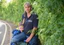 Parish Councillor Gemma Marriage (pictured with her son, Stanley) said that the overgrown pathway is posing a danger to Bucklesham schoolchildren. Image: Charlotte Bond
