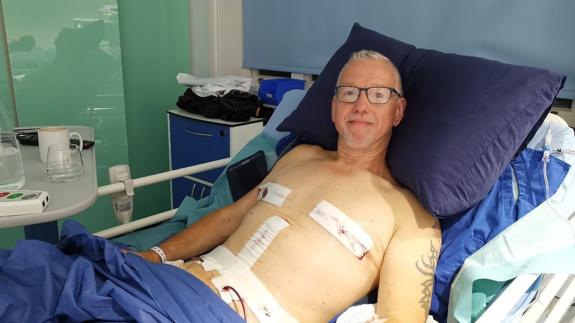 East Anglian Daily Times: Mr Edwards is currently recovering at home following his operation, but still leads runners at Alton Water and hopes to turn his positive attitude into a job as a motivational speaker Picture: HARLEY STREET SKIN CLINIC/ EMMA CATTELL East Anglian Daily Times: Mr Edwards is currently recovering at home following his operation, but still leads runners at Alton Water and hopes to turn his positive attitude into a job as a motivational speaker Picture: HARLEY STREET SKIN CLINIC/ EMMA CATTELL