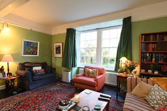 East Anglian Daily Times: The drawing room has an open fireplace and sash windows East Anglian Daily Times: The drawing room has an open fireplace and sash windows