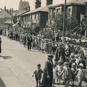 George V’s Silver Jubilee in 1935 shows children walking to the Caxton Recreation Ground in Beccles for an afternoon of Jubilee fun.