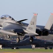 An F-15 fighter jet takes off at RAF Lakenheath