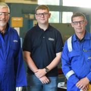 Jack Milton, (pictured centre with managers at Sizewell C) is a projects control apprentice at the nuclear power station