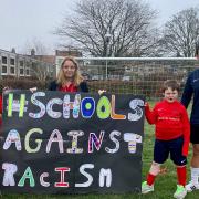Pupils from Red Oak Primary School with head teacher Heather Madsen and Johnny Lee, PE and Sports co-ordinator, have launched a national campaign entitled 'Schools Against Racism'. Picture: Red Oak Primary School
