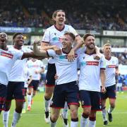 All singing, all dancing. Bolton Wanderers' George Johnston (centre) celebrates scoring his side's fifth goal of the game at Portman Road last season. The Trotters ended 2021/22 as the form team. It will be a tough gig for Town today.