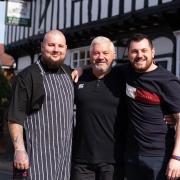 Neil Smith MBE, and his sons Matt and Dan outside their pub The Bell and Steelyard, which is the oldest in Woodbridge
