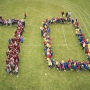 The moment all 340 children at Sir Robert Hitchams Primary School in Framlingham came together to celebrate the Queen's Platinum Jubilee by creating a 70.