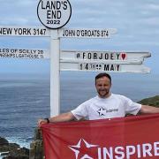 Ali Clements completes his challenge at Land's End in memory of Joe Langfield