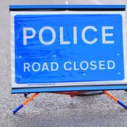 A road is closed after a serious two-vehicle crash