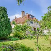 The property enjoys lovely gardens which are well-stocked with fruiting trees