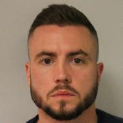 Former police officer Jamie Lewis who was jailed after taking pictures of murdered sisters is due to appeal his sentence