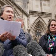 Cathy Gardner (left) and Fay Harris, whose fathers died from Covid-19, speaking outside the Royal Courts of Justice.