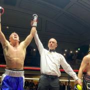Suffolk boxer Jordan Warne has his hand raised after beating Robbie Chapman on his pro debut at the iconic York Hall