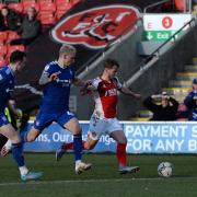 Luke Woolfenden and George Edmundson close down late in the game at Fleetwood Town.