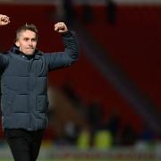 Ipswich Town manager Kieran McKenna celebrates the away win at Doncaster.