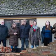 Residents on Orford Road are concerned after cars crashed into their walls. L-R Katherine Barton, Dominic Carter, Stephanie Hart, Peter Snook, Laura Gwynne, Sophie Yeoman and Laurie Barrow. Picture: Sarah Lucy Brown