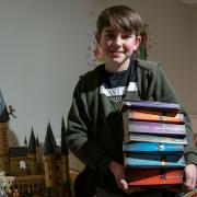 Eli Chmelik, 11, who has set the Guinness World Record for identifying the most Harry Potter characters from quotes from the Harry Potter films in one minute, at his home in Manningtree, Essex.